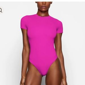 SKIMS hot pink body suit. XXS